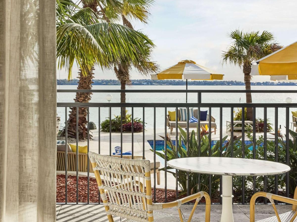 The Beachcomber Hotel & Resort, Ascend Hotel Collection Toukley Kültér fotó View of the pool at the Hotel St. George