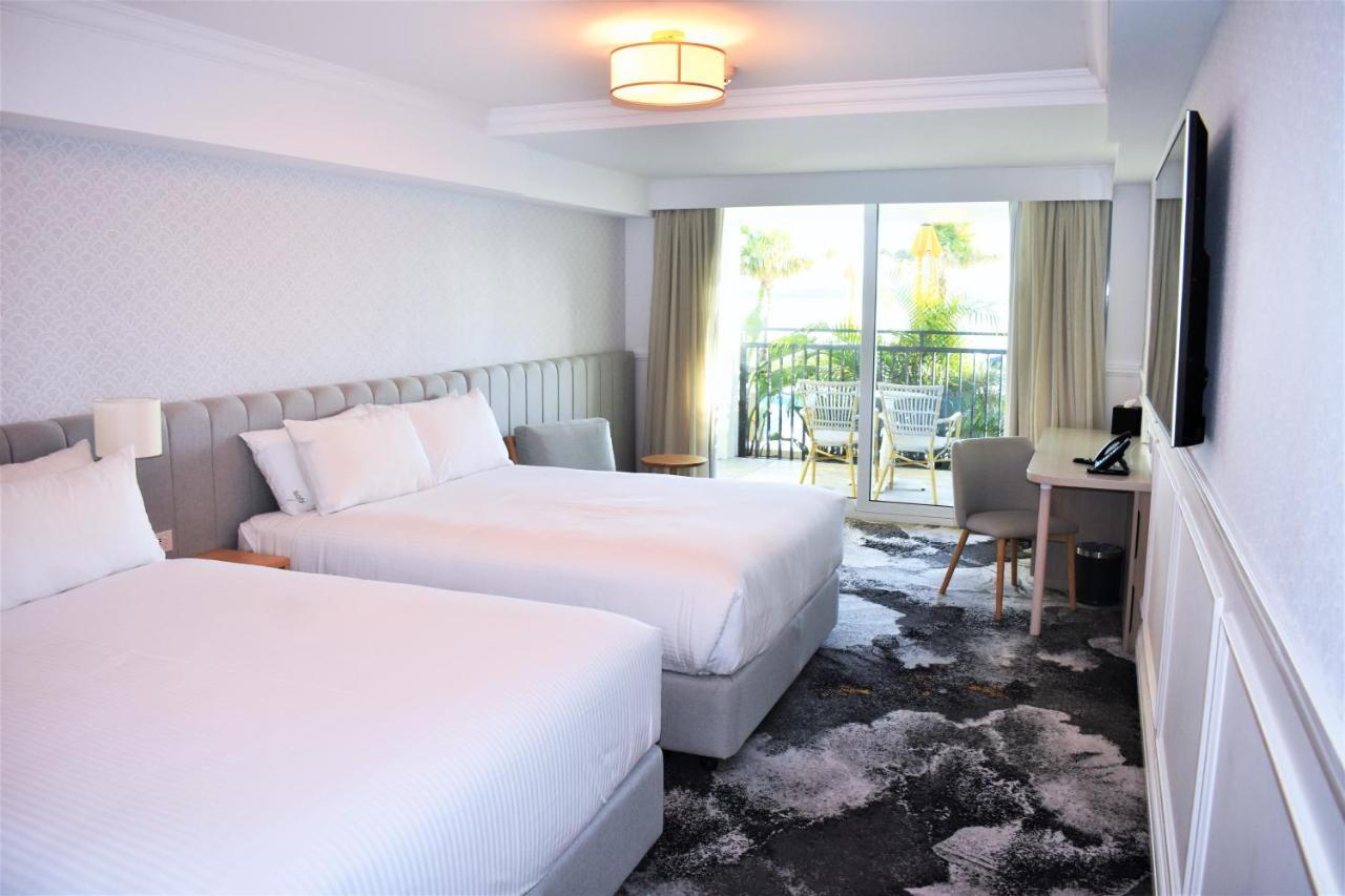 The Beachcomber Hotel & Resort, Ascend Hotel Collection Toukley Kültér fotó A room at the hotel