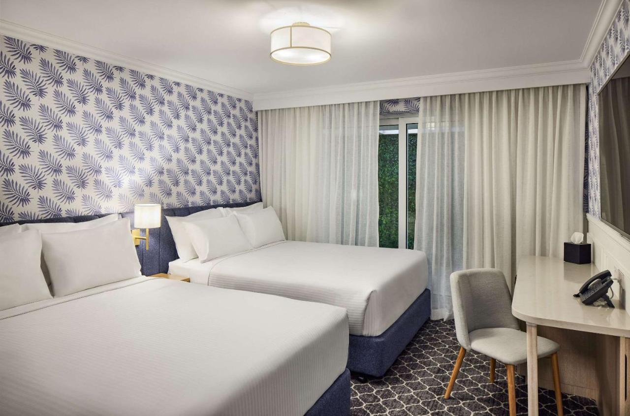 The Beachcomber Hotel & Resort, Ascend Hotel Collection Toukley Kültér fotó A room at the hotel